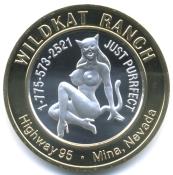 Wildkat Ranch $10 bi-metallic silver strike brothel token