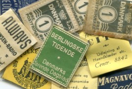 Danish WWII era encased postage stamps Danish WWII era encased postage stamps
